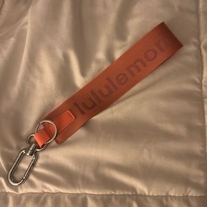 Pink lululemon keychain